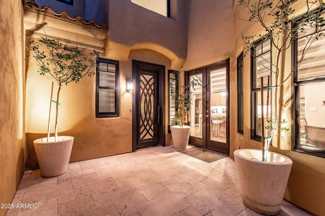 a kitchen with granite countertop a sink appliances cabinets and counter space