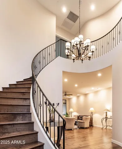 a kitchen with counter top space and wooden floor