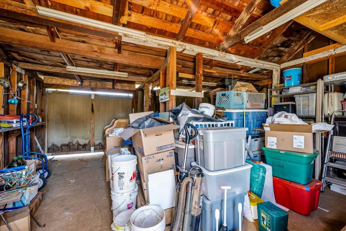232 Upper Slate Creek Road Grass Valley, CA 95945 - Photo 40 of 48 a storage room with washer and dryer