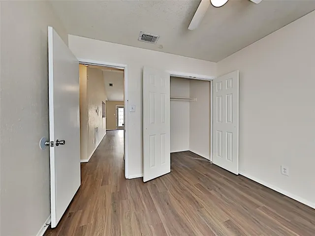 a bathroom with a sink mirror toilet and shower