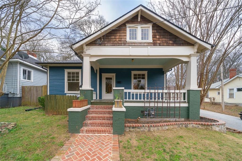 505 Hopkins Street Southwest Atlanta, GA 30310 - Photo 1 of 1 a view of a house with a yard