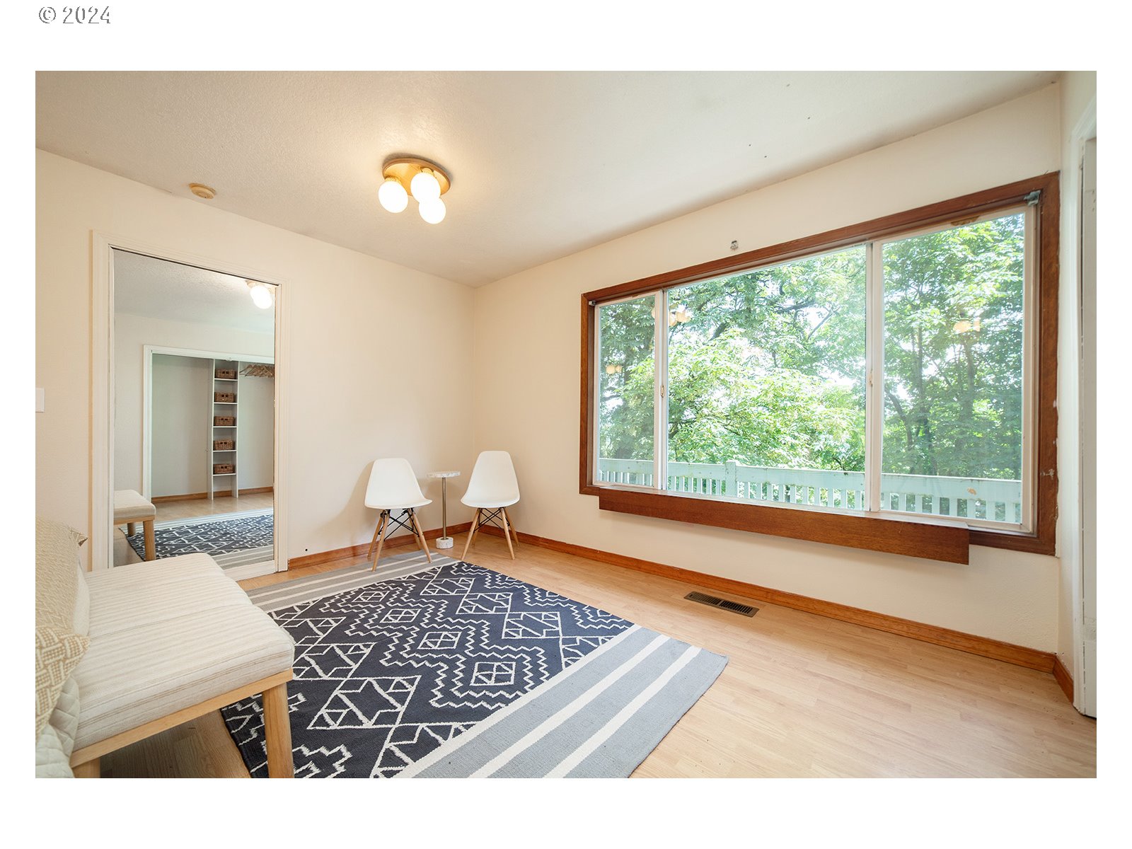 8767 Northwest Springville Road Portland, OR 97231 - Photo 11 of 47 a living room with furniture and a large window