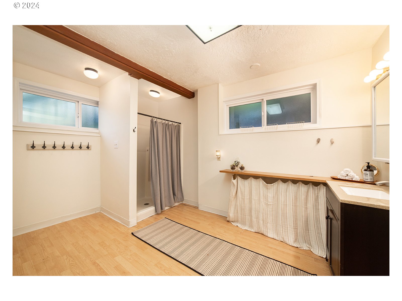 8767 Northwest Springville Road Portland, OR 97231 - Photo 15 of 47 a view of a hallway with an entryway