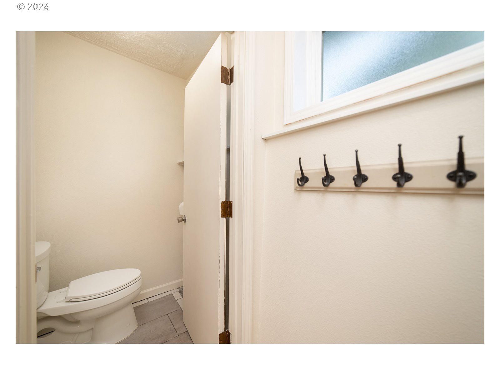 8767 Northwest Springville Road Portland, OR 97231 - Photo 17 of 47 a bathroom with a granite countertop sink and a toilet