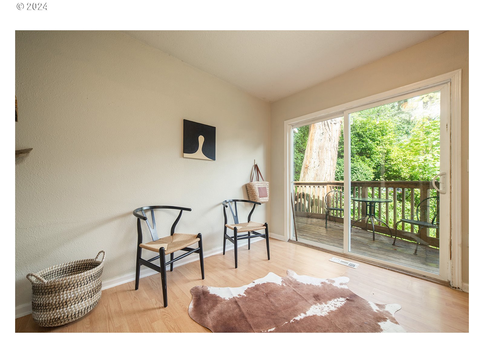 8767 Northwest Springville Road Portland, OR 97231 - Photo 22 of 47 a view of a living room and a window