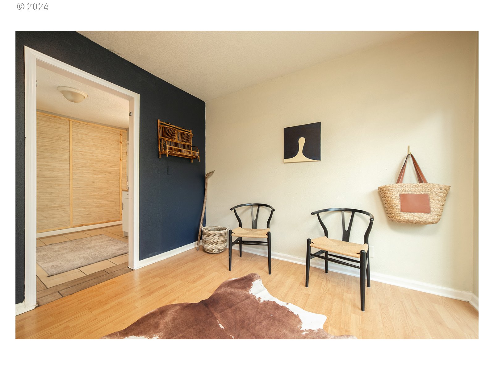 8767 Northwest Springville Road Portland, OR 97231 - Photo 24 of 47 a view of livingroom with furniture and wooden floor