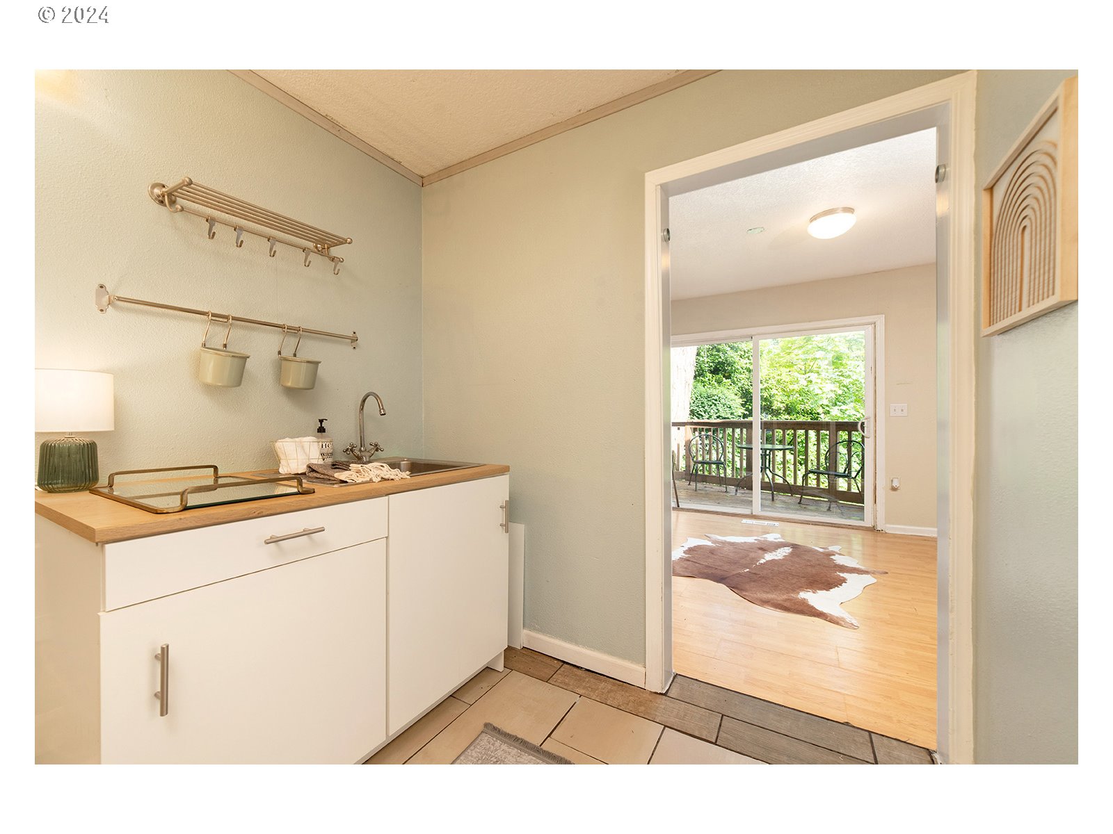8767 Northwest Springville Road Portland, OR 97231 - Photo 27 of 47 a view of a kitchen cabinets and a sink