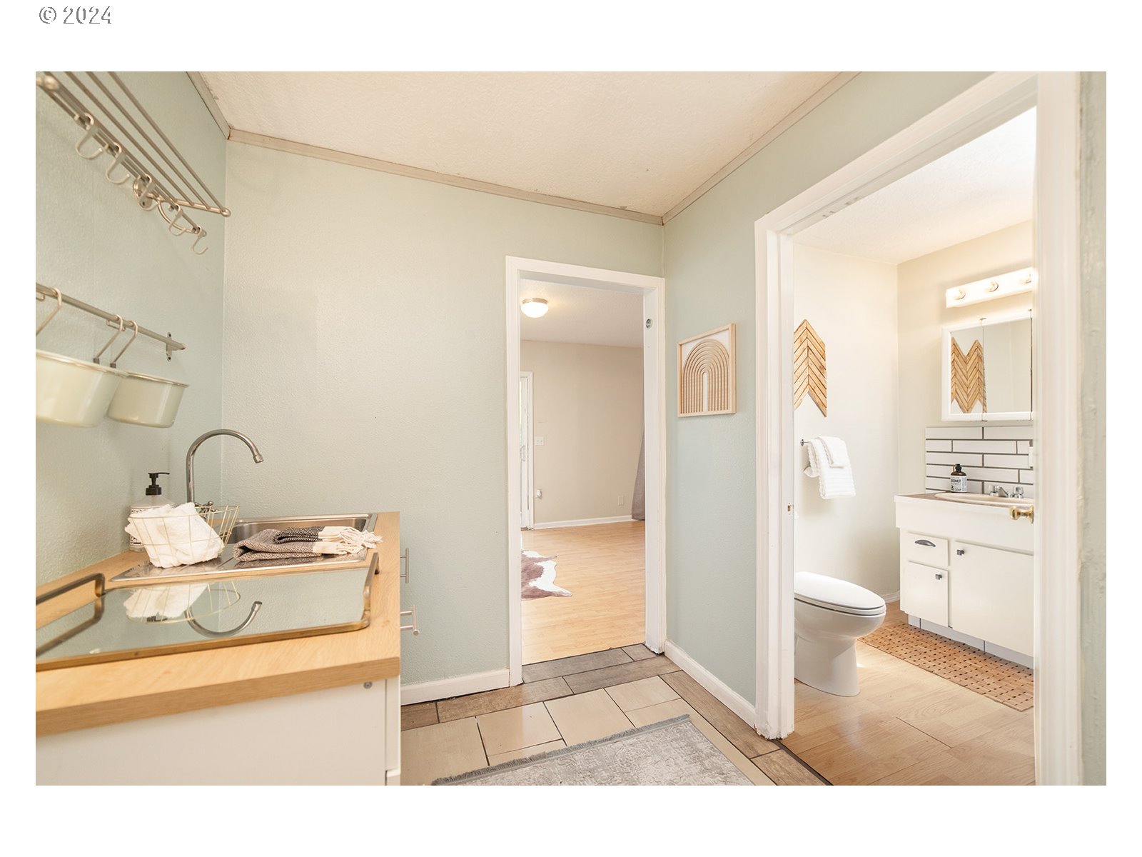 8767 Northwest Springville Road Portland, OR 97231 - Photo 28 of 47 a bathroom with a sink and a mirror