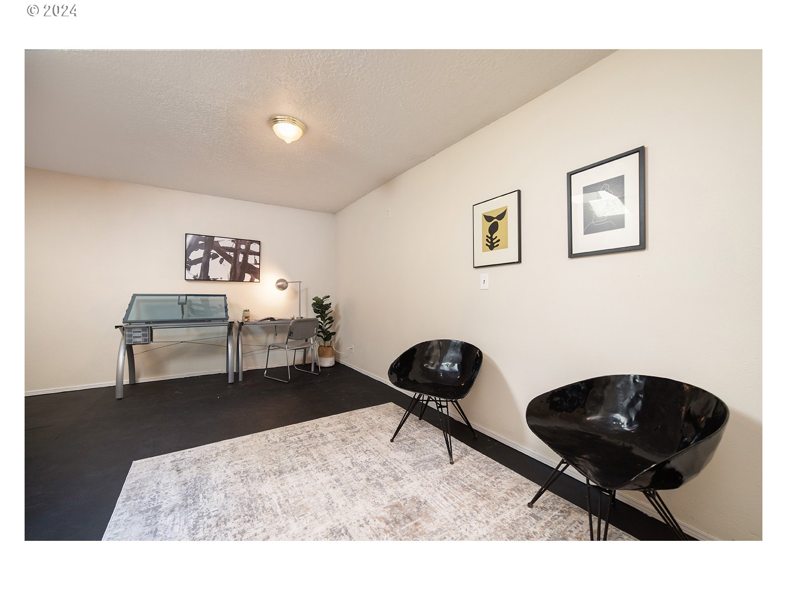 8767 Northwest Springville Road Portland, OR 97231 - Photo 32 of 47 a living room with furniture and a rug
