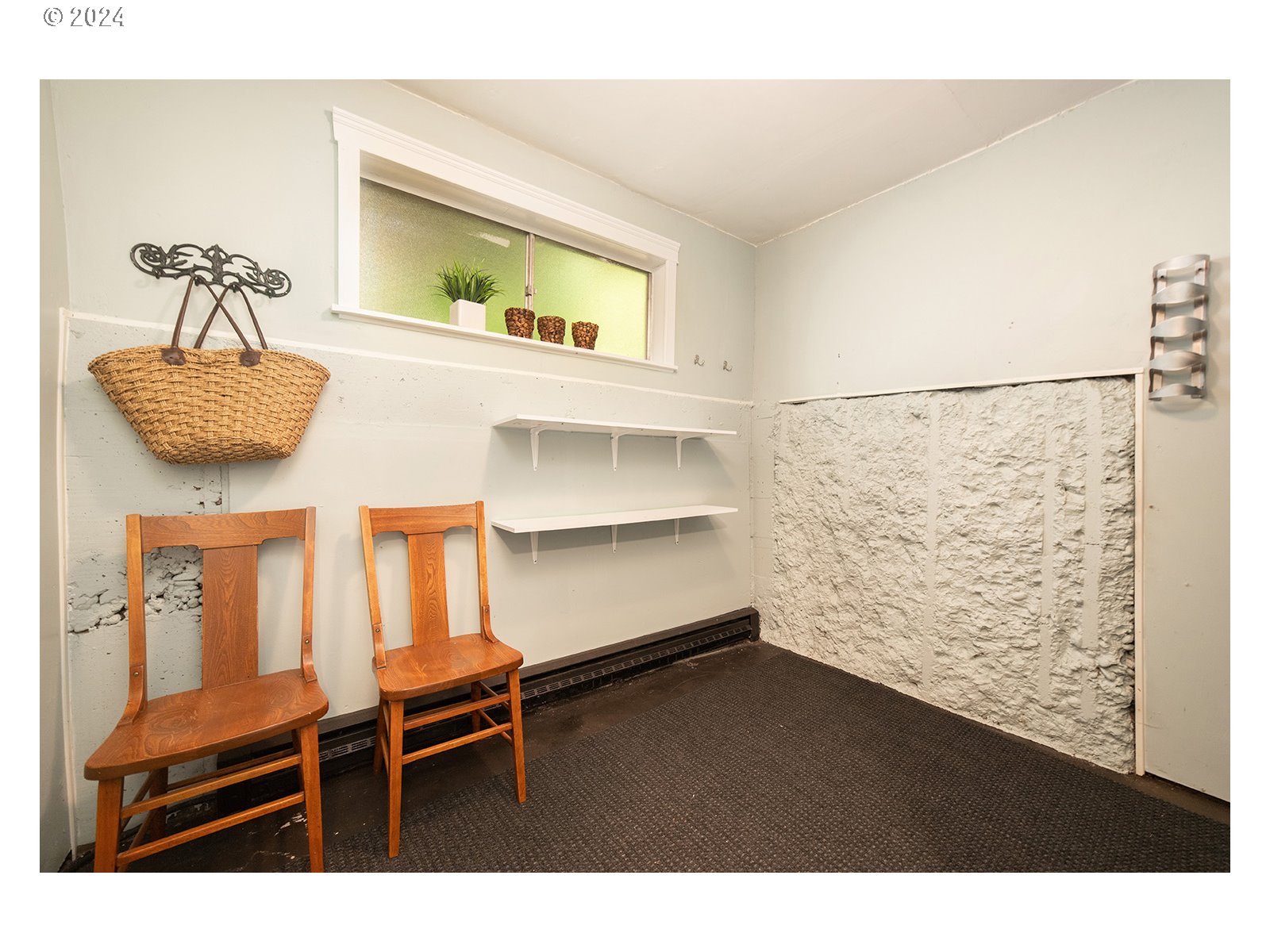 8767 Northwest Springville Road Portland, OR 97231 - Photo 33 of 47 a living room with furniture and a window