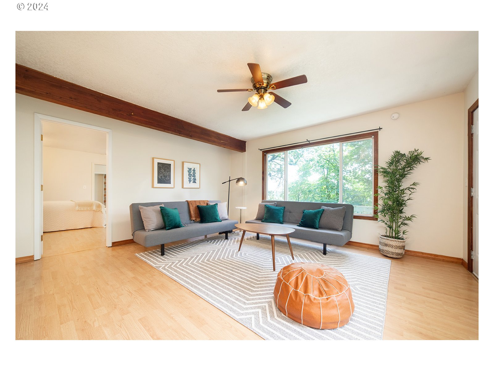 8767 Northwest Springville Road Portland, OR 97231 - Photo 4 of 47 a living room with furniture and a large window