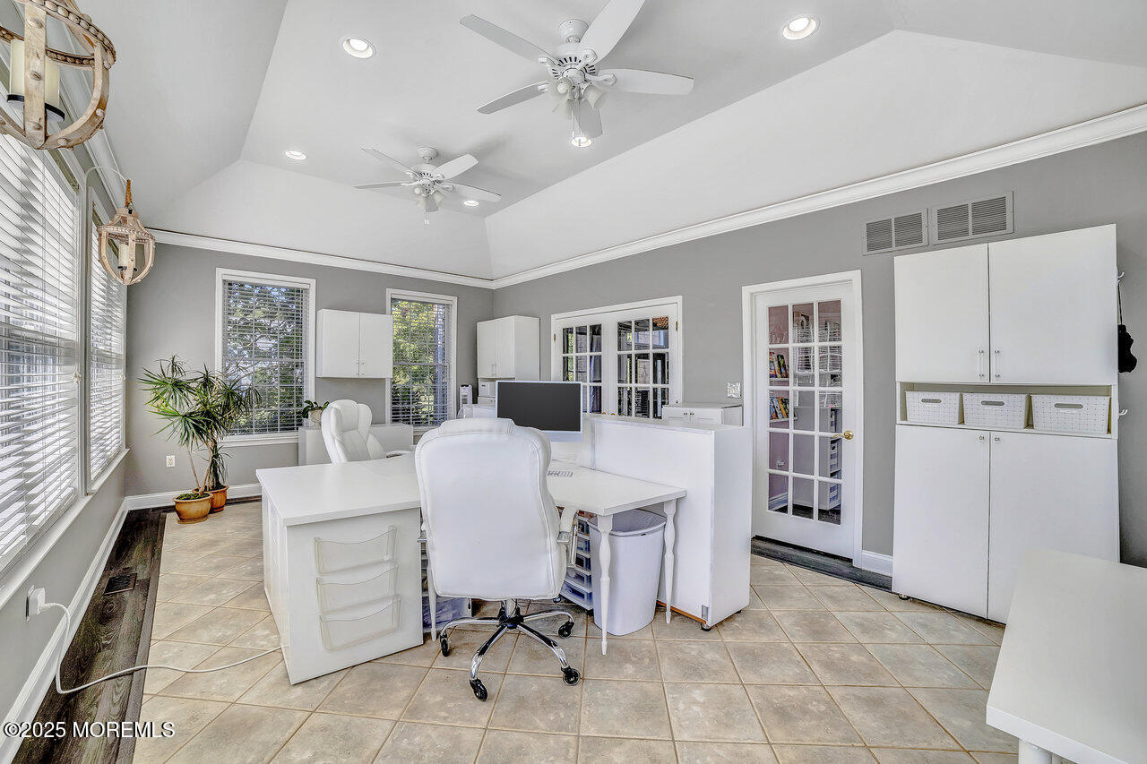 11 Victoria Court Cream Ridge, NJ 08514 - Photo 19 of 67 a living room with furniture a dining table and a refrigerator