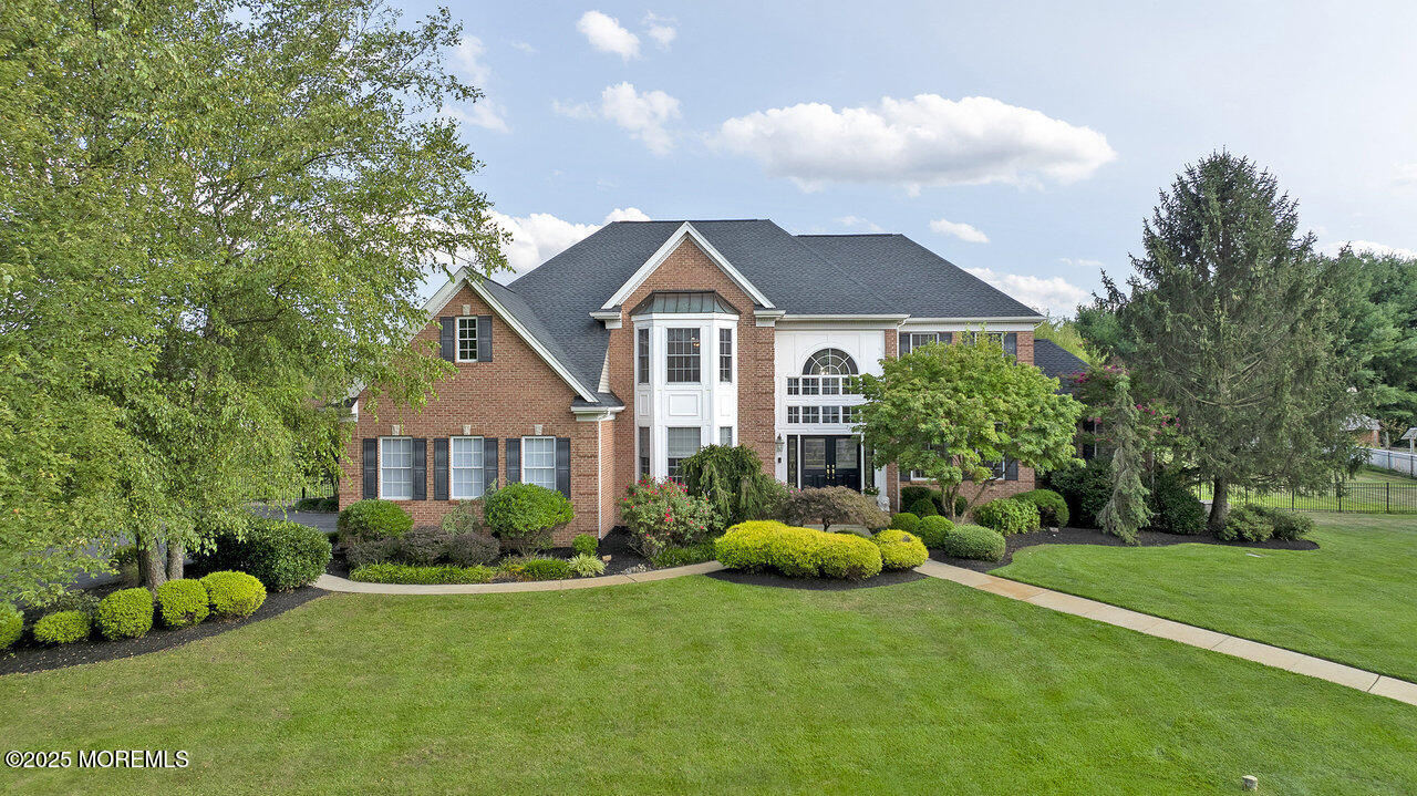 11 Victoria Court Cream Ridge, NJ 08514 - Photo 2 of 67 a front view of house with yard and green space