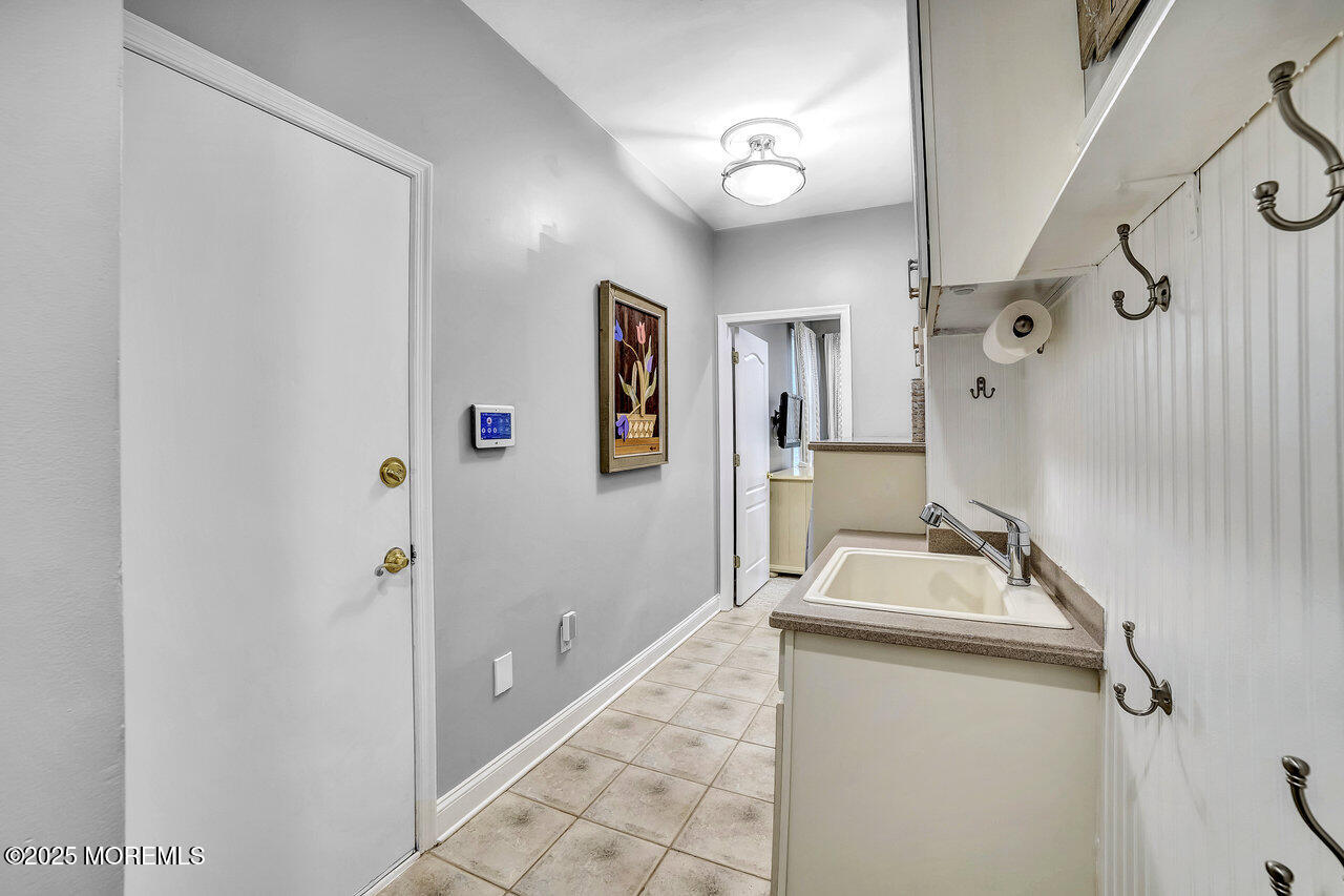 11 Victoria Court Cream Ridge, NJ 08514 - Photo 22 of 67 a room with a washer and dryer