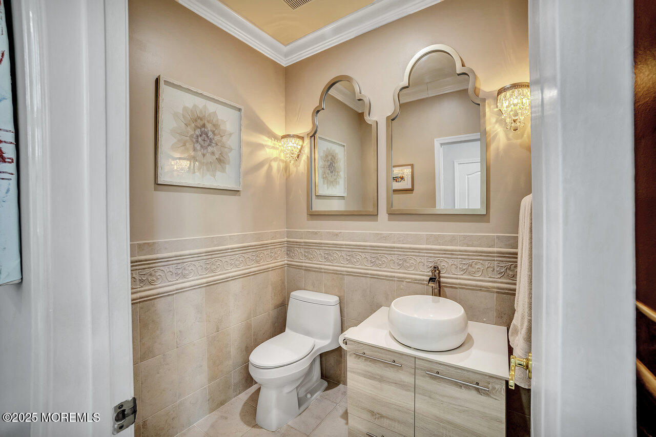11 Victoria Court Cream Ridge, NJ 08514 - Photo 23 of 67 a bathroom with a granite countertop toilet sink and mirror
