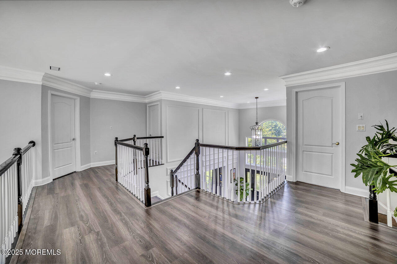 11 Victoria Court Cream Ridge, NJ 08514 - Photo 26 of 67 a view of a hallway with wooden floor and stairs