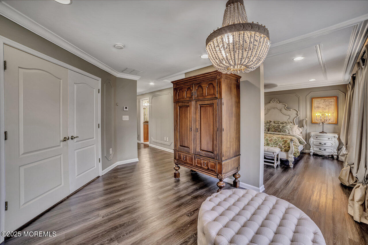 11 Victoria Court Cream Ridge, NJ 08514 - Photo 28 of 67 a view of a livingroom with furniture wooden floor chandelier and windows