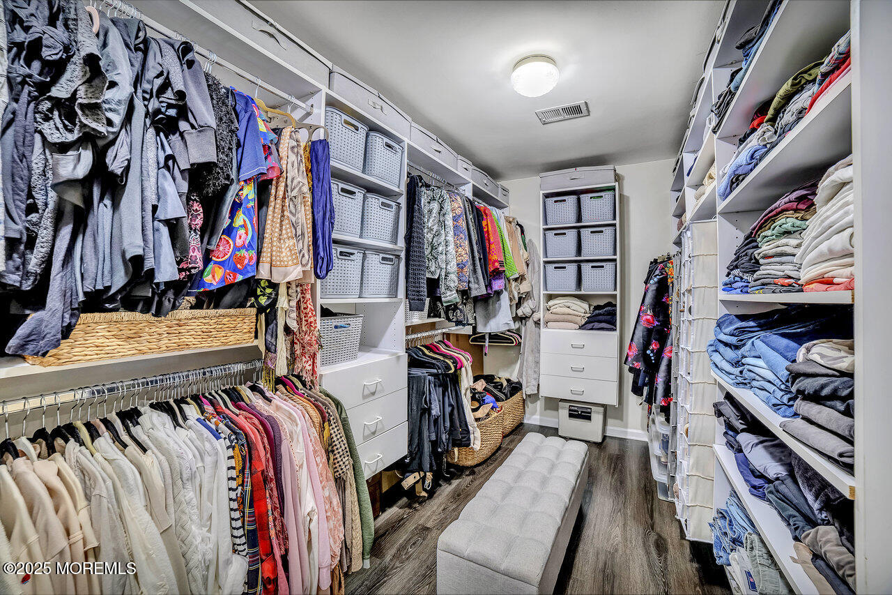 11 Victoria Court Cream Ridge, NJ 08514 - Photo 33 of 67 a view of walk in closet with clothes