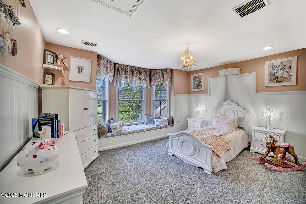 11 Victoria Court Cream Ridge, NJ 08514 - Photo 34 of 67 a spacious bedroom with a bed and a large window