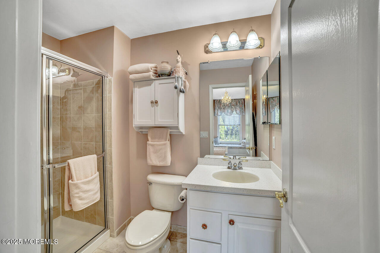 11 Victoria Court Cream Ridge, NJ 08514 - Photo 36 of 67 a bathroom with a toilet sink and mirror