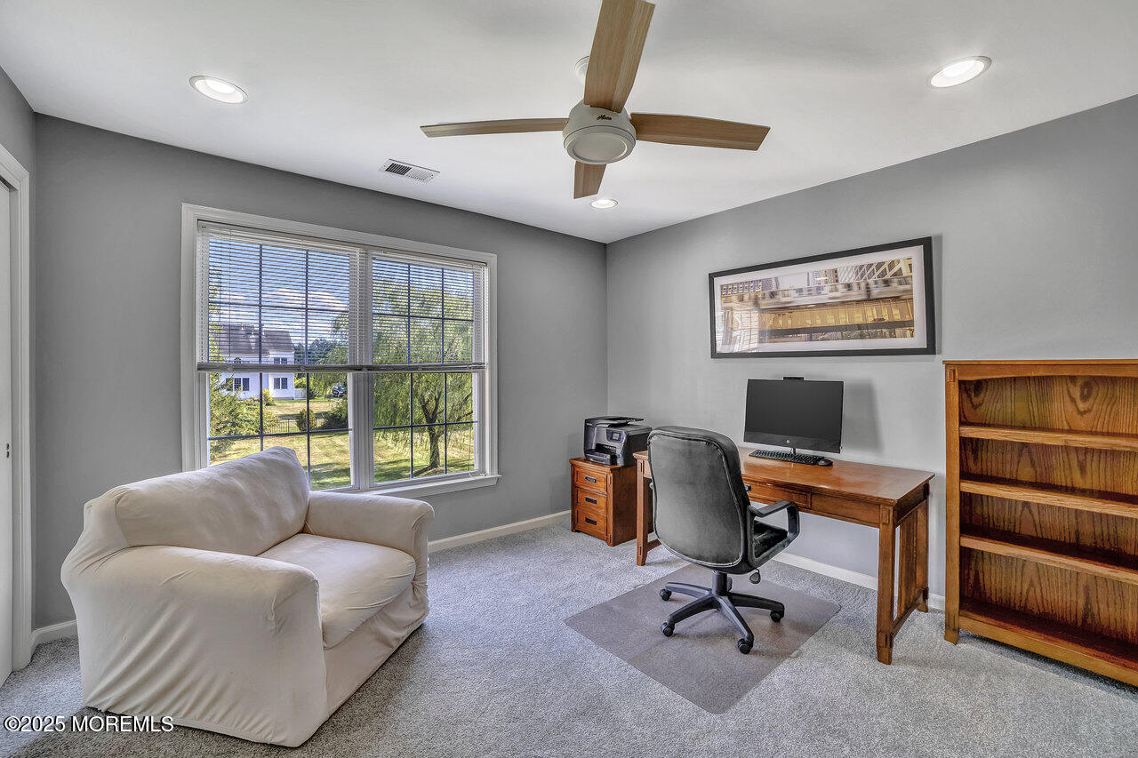 11 Victoria Court Cream Ridge, NJ 08514 - Photo 37 of 67 a view of a livingroom with workspace and a window