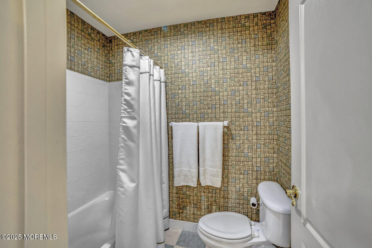 11 Victoria Court Cream Ridge, NJ 08514 - Photo 40 of 67 a white toilet sitting next to a bathroom sink