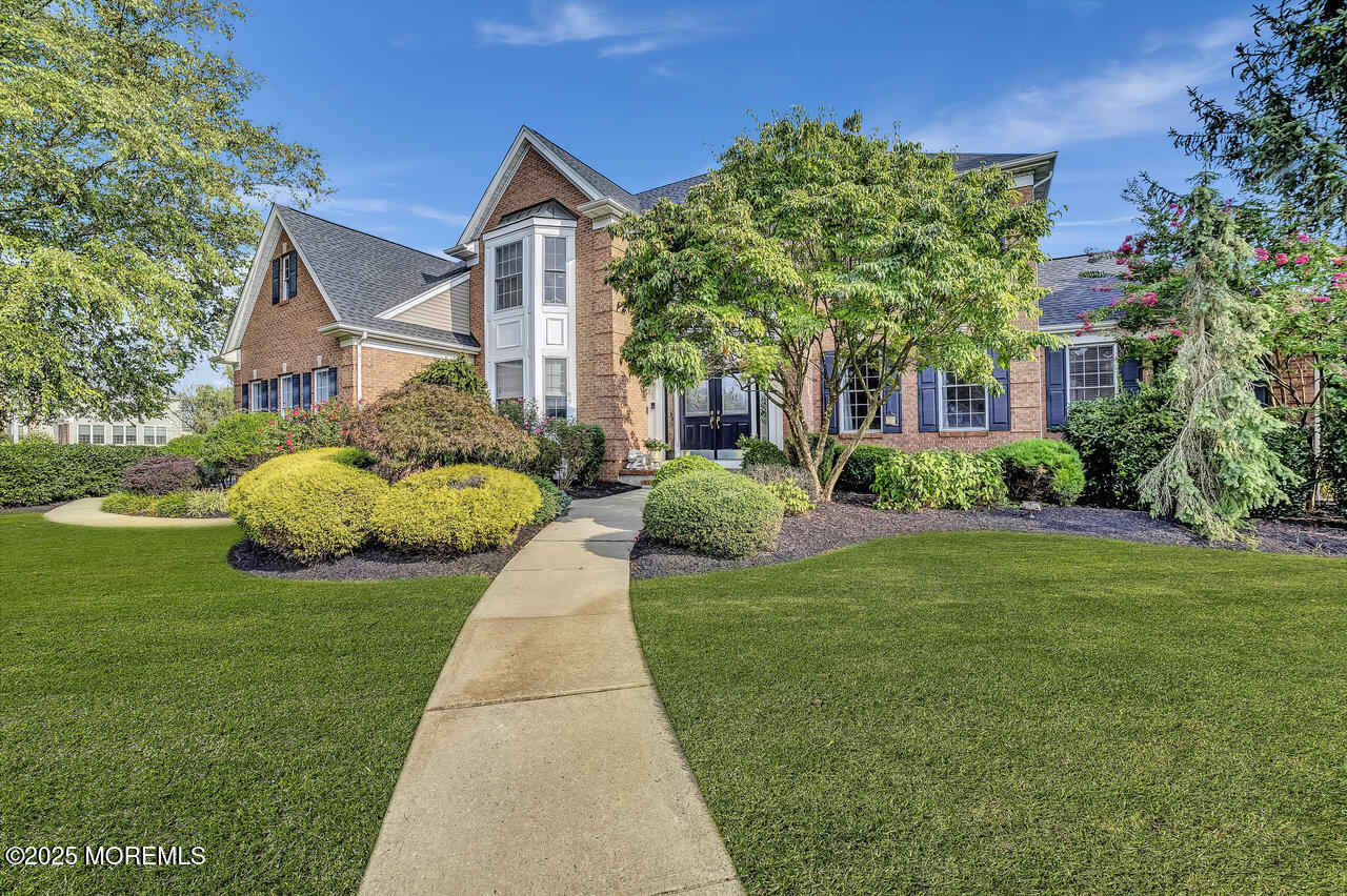 11 Victoria Court Cream Ridge, NJ 08514 - Photo 4 of 67 a front view of a house with garden