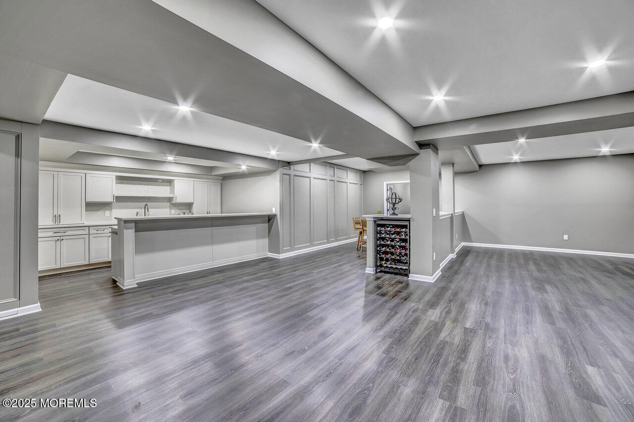 11 Victoria Court Cream Ridge, NJ 08514 - Photo 41 of 67 a room with wooden floor and a ceiling fan