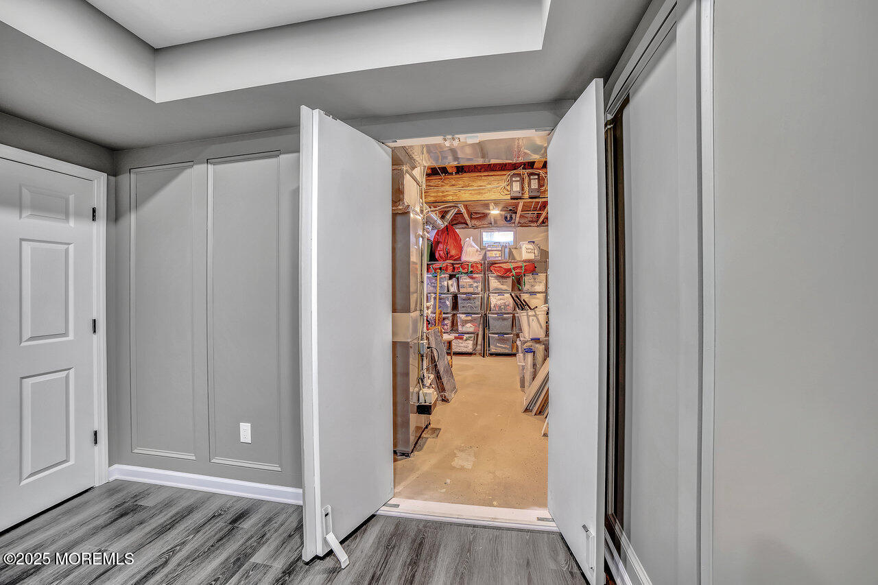 11 Victoria Court Cream Ridge, NJ 08514 - Photo 52 of 67 a view of a hallway with wooden floor and entryway