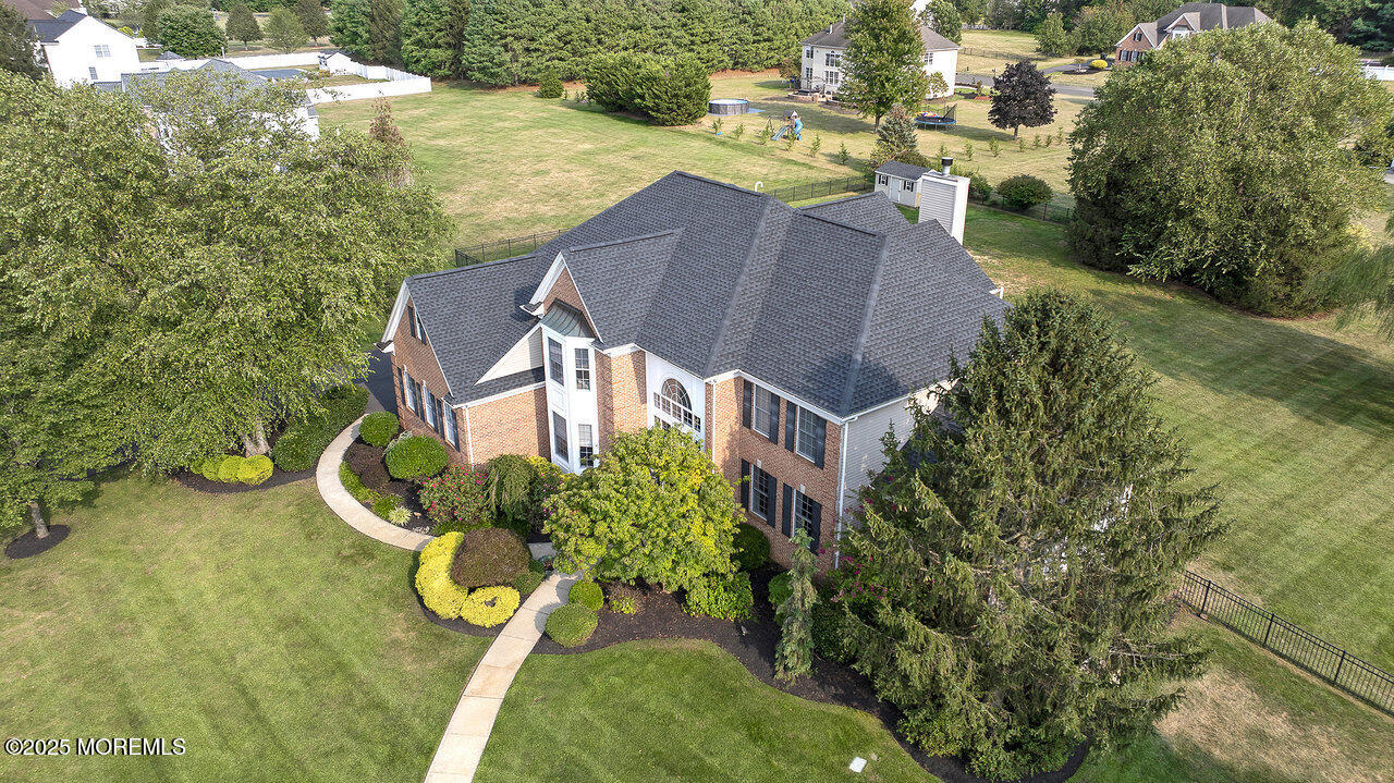 11 Victoria Court Cream Ridge, NJ 08514 - Photo 54 of 67 an aerial view of a house with swimming pool and garden