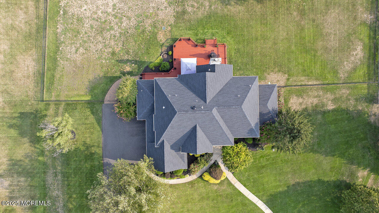 11 Victoria Court Cream Ridge, NJ 08514 - Photo 64 of 67 a aerial view of a house with pool and trees