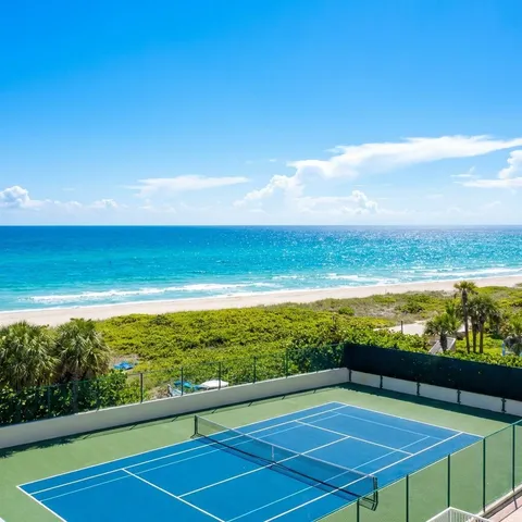 a view of an ocean with beach