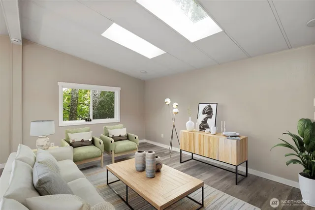 a living room with furniture and window