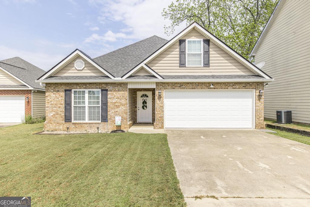 433 Bob White Road Macon, GA 31216 - Photo 1 of 1 a view of a house with a yard and garage