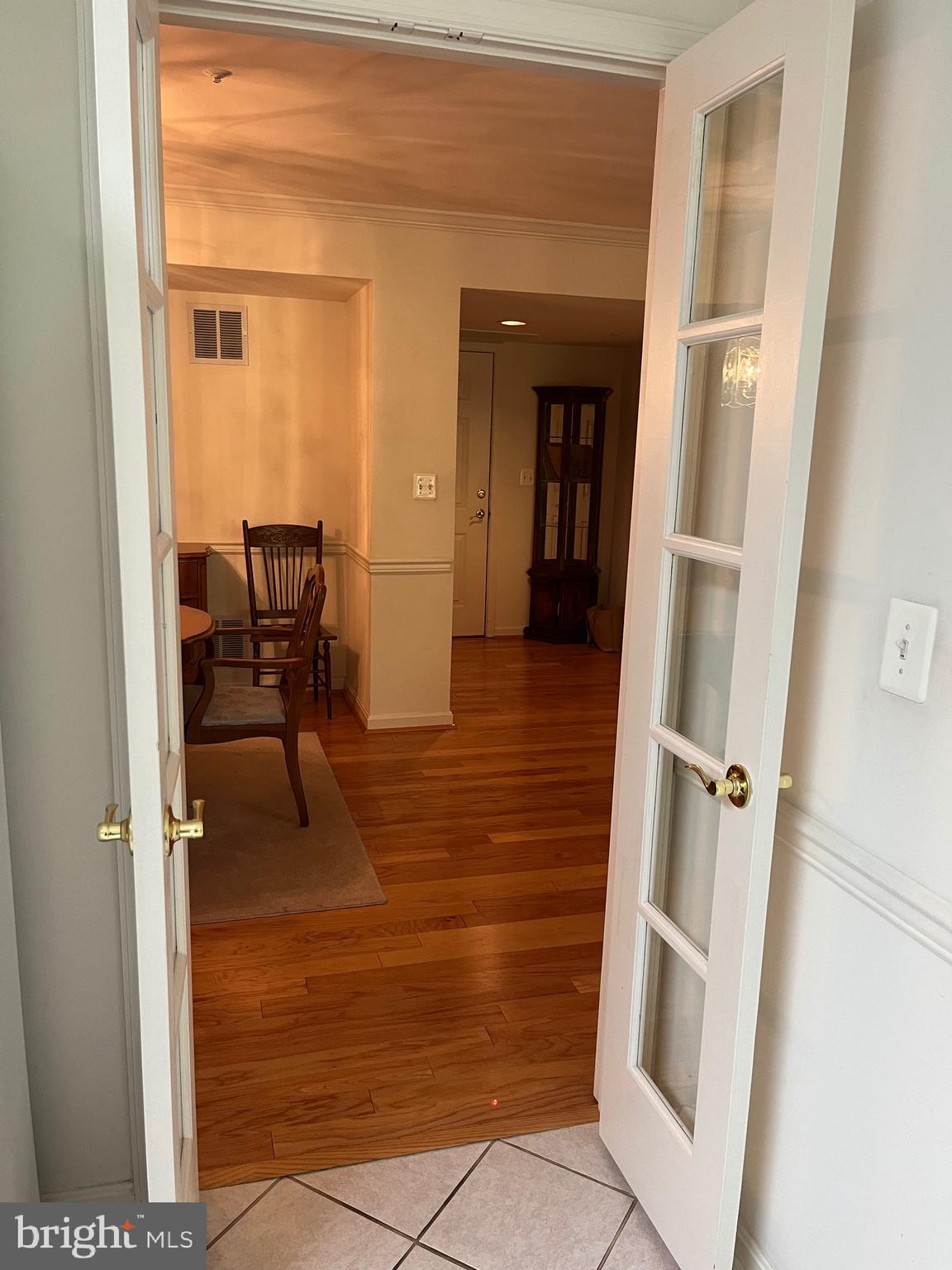 12310 Rosslare Ridge Road, Unit 305 Lutherville-Timonium, MD 21093 - Photo 23 of 43 Glass pane doors from kitchen to dining room