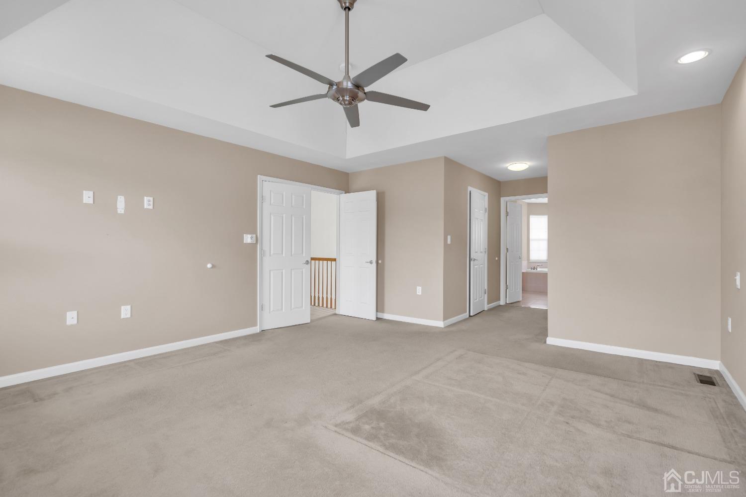 33 Carnation Road Monroe Township, NJ 08831 - Photo 27 of 46 a view of an empty room with a ceiling fan