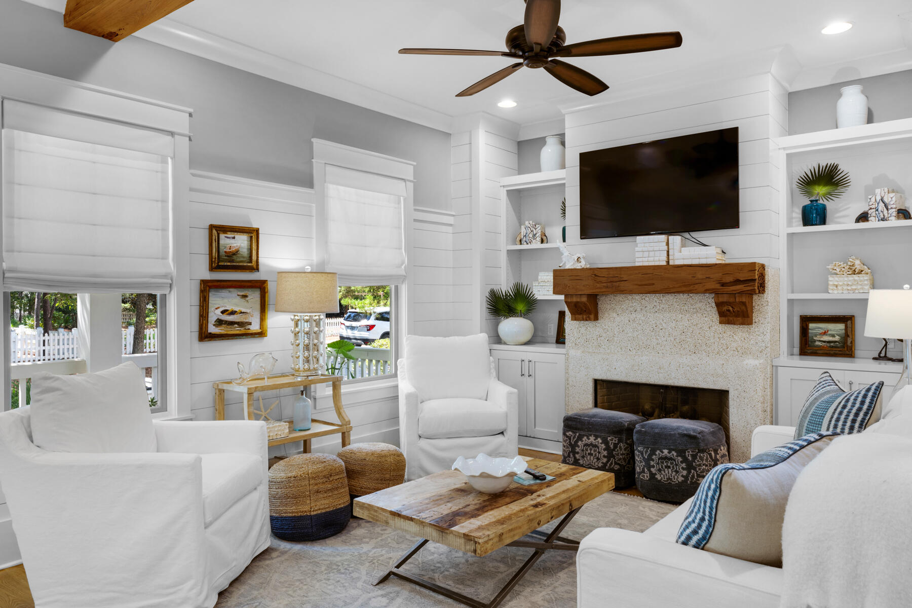 87 Salt Box Lane West Inlet Beach, FL 32461 - Photo 15 of 122 a living room with furniture a flat screen tv and a fireplace