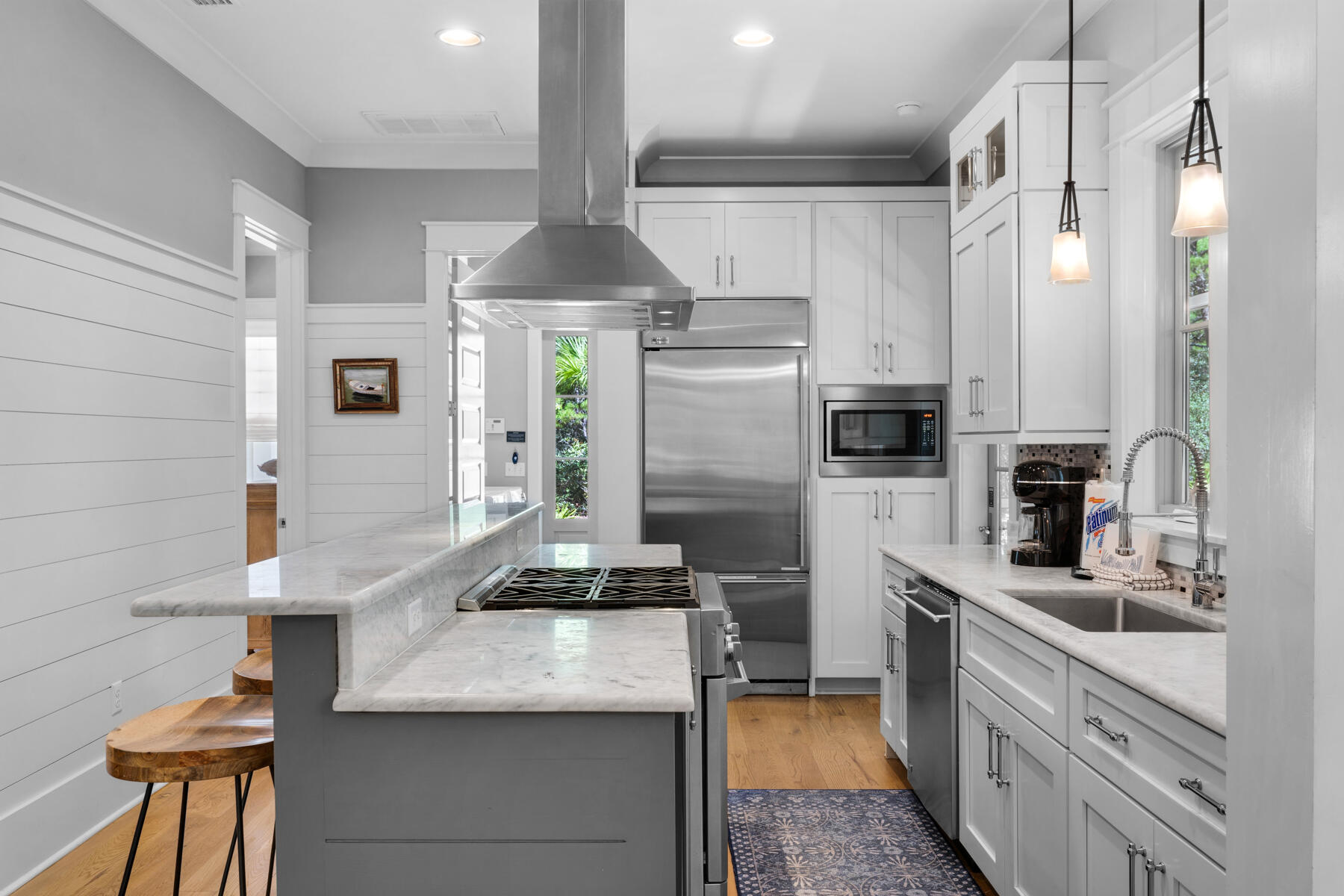 87 Salt Box Lane West Inlet Beach, FL 32461 - Photo 21 of 122 a kitchen with stainless steel appliances a sink stove refrigerator and cabinets