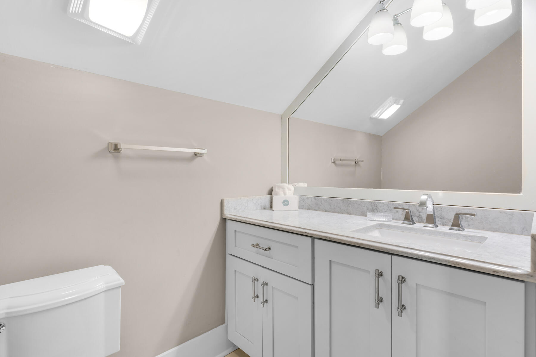 87 Salt Box Lane West Inlet Beach, FL 32461 - Photo 37 of 122 a bathroom with a granite countertop sink a toilet and a mirror