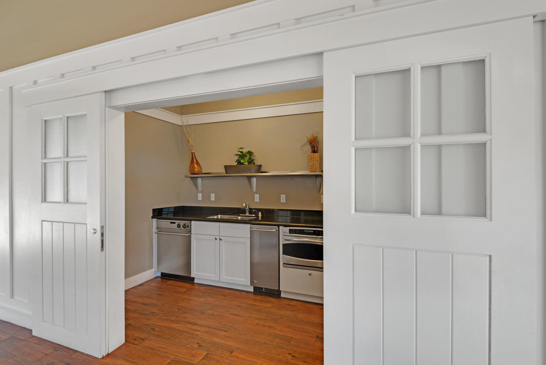 87 Salt Box Lane West Inlet Beach, FL 32461 - Photo 71 of 122 a kitchen with granite countertop a stove and a refrigerator