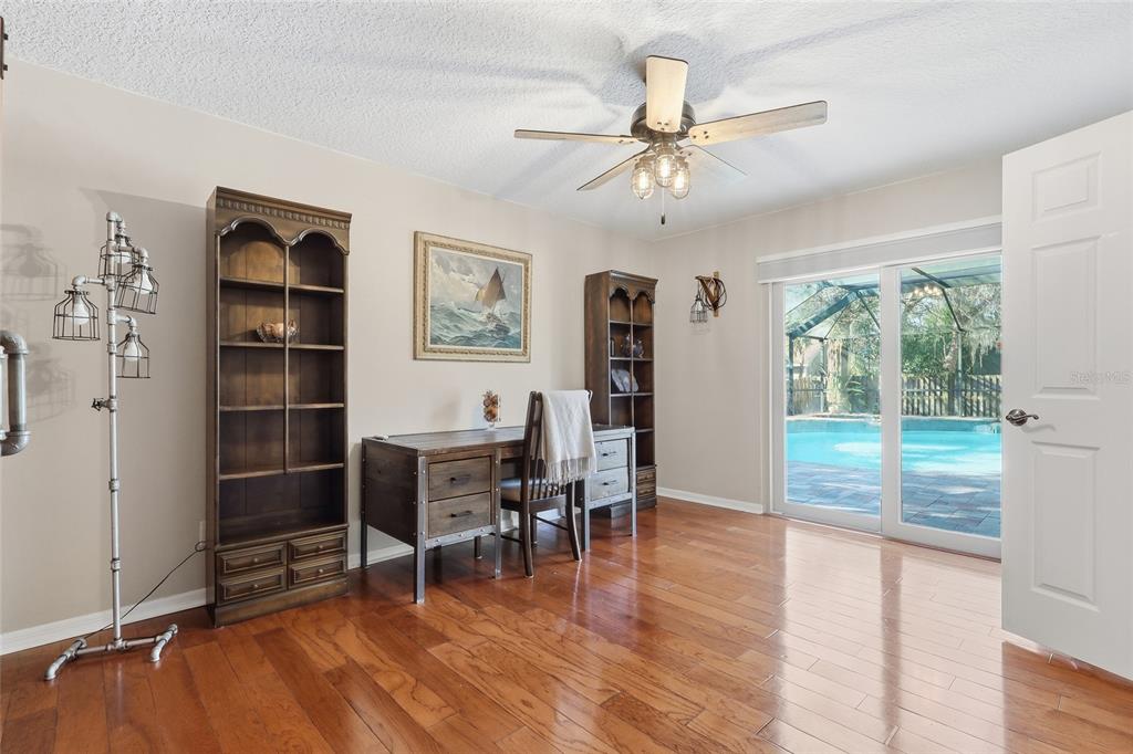 3488 Ridge Boulevard Palm Harbor, FL 34684 - Photo 20 of 30 a view of a workspace with furniture and a window