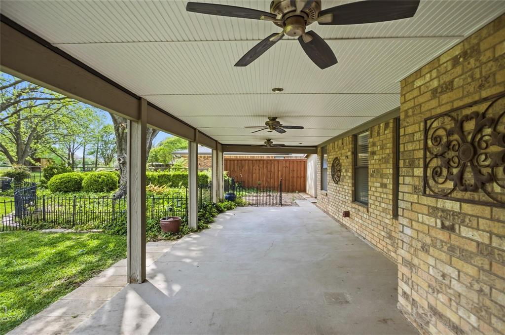 265 East Dove Road Southlake, TX 76092 - Photo 30 of 39 a view of a porch with a flat screen tv