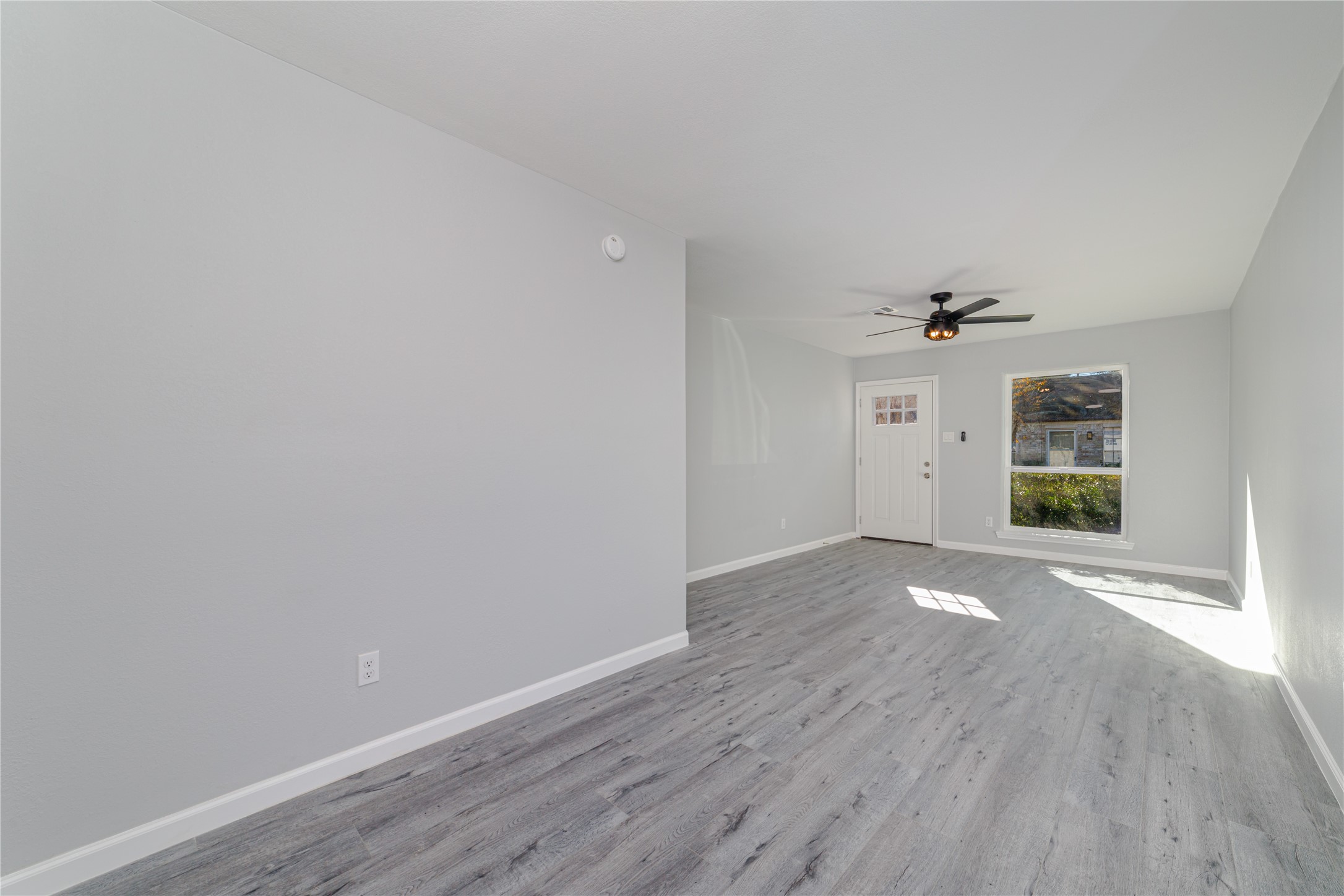 1716 Crestdale Drive, Unit 10 Houston, TX 77080 - Photo 10 of 21 wooden floor in an empty room