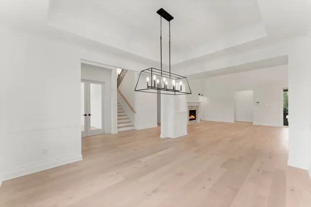a view of a chandelier in an empty room