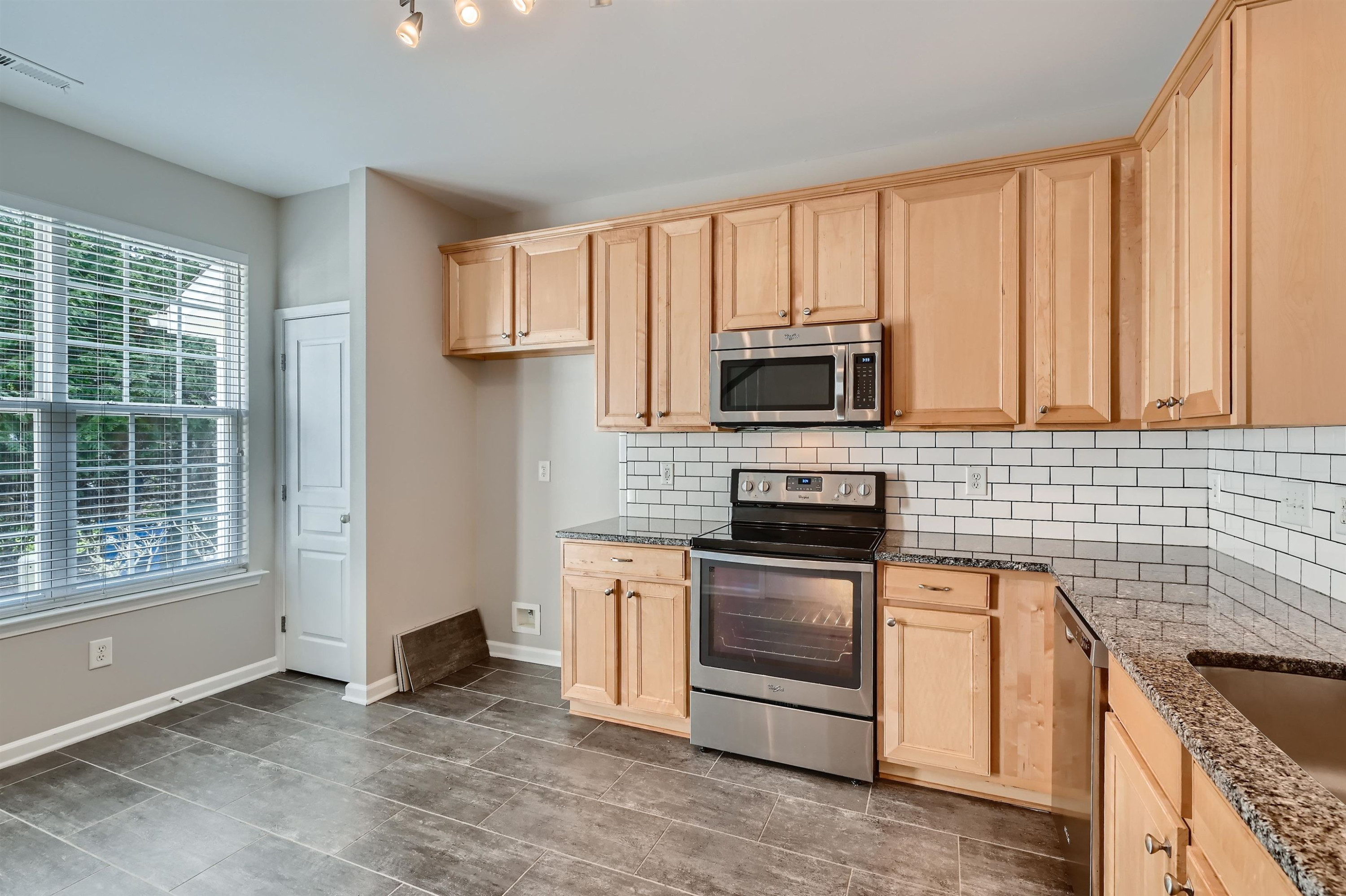 7867 Silverthread Lane Raleigh, NC 27617 - Photo 12 of 28 Kitchen- Main Floor