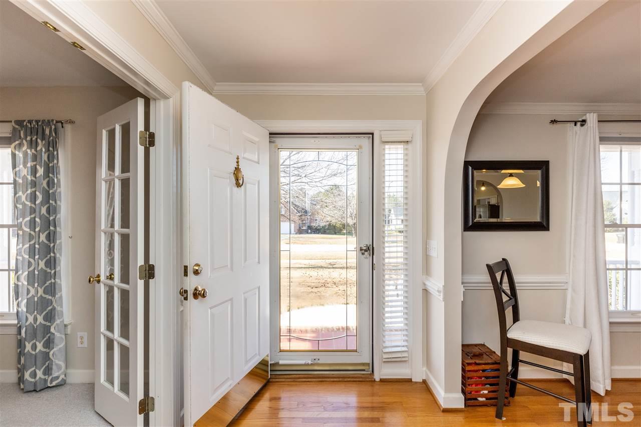 1016 Red Brick Road Garner, NC 27529 - Photo 2 of 29 a view of a hallway with workspace and a window