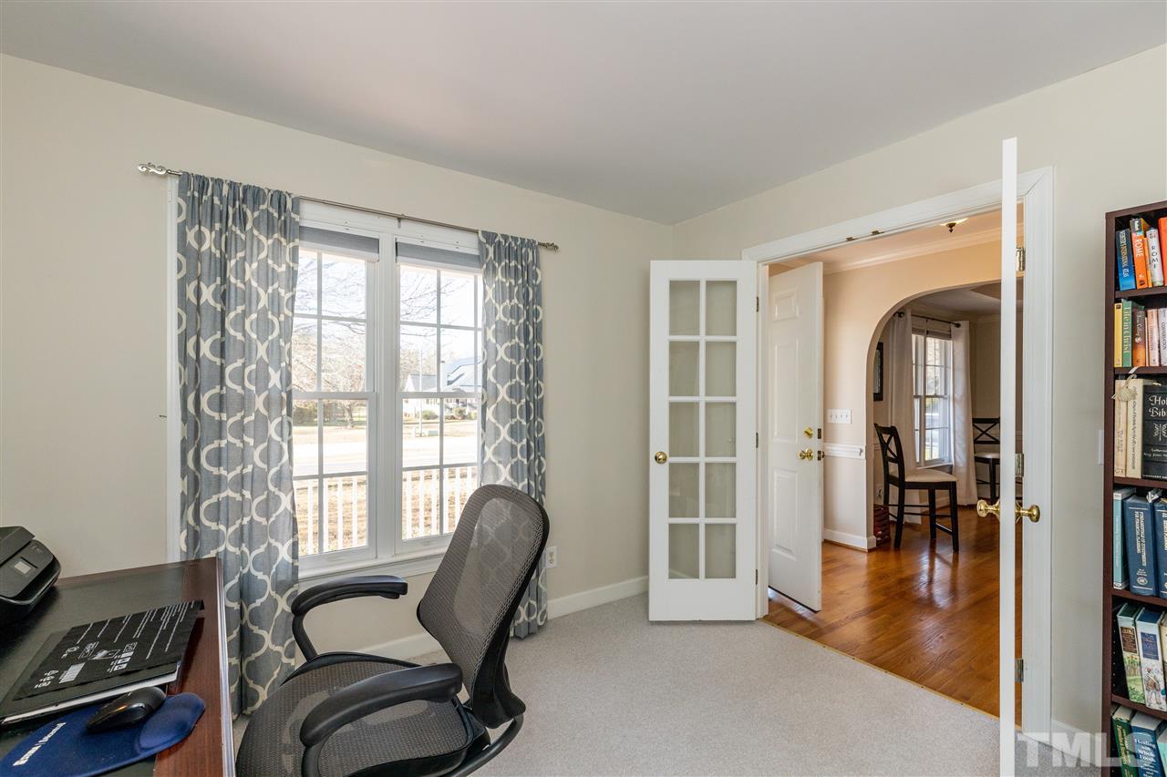 1016 Red Brick Road Garner, NC 27529 - Photo 3 of 29 a view of a livingroom with furniture and a window