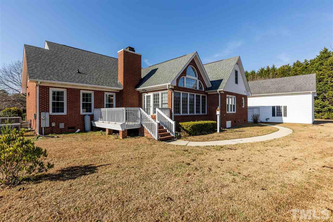 1016 Red Brick Road Garner, NC 27529 - Photo 27 of 29 a front view of a house with a yard