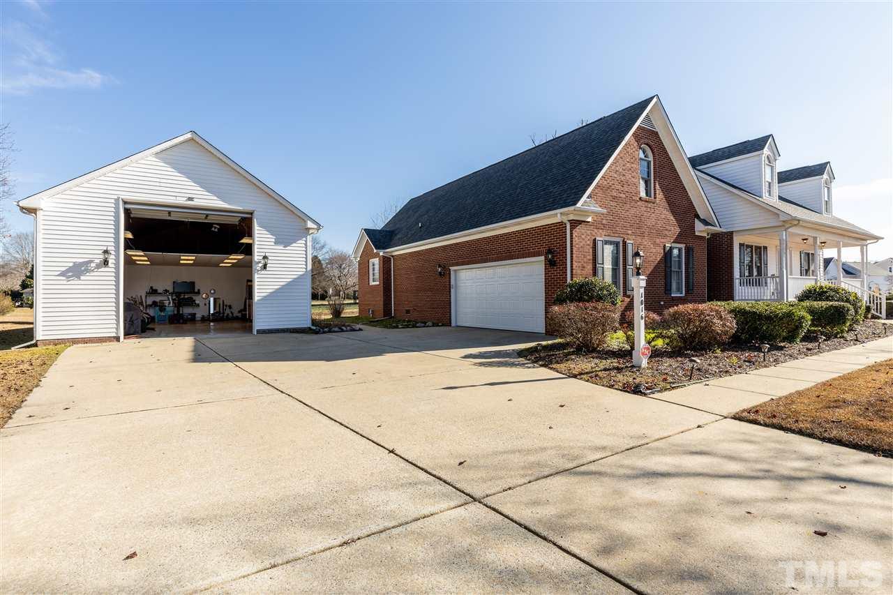 1016 Red Brick Road Garner, NC 27529 - Photo 29 of 29 a front view of a house with a yard