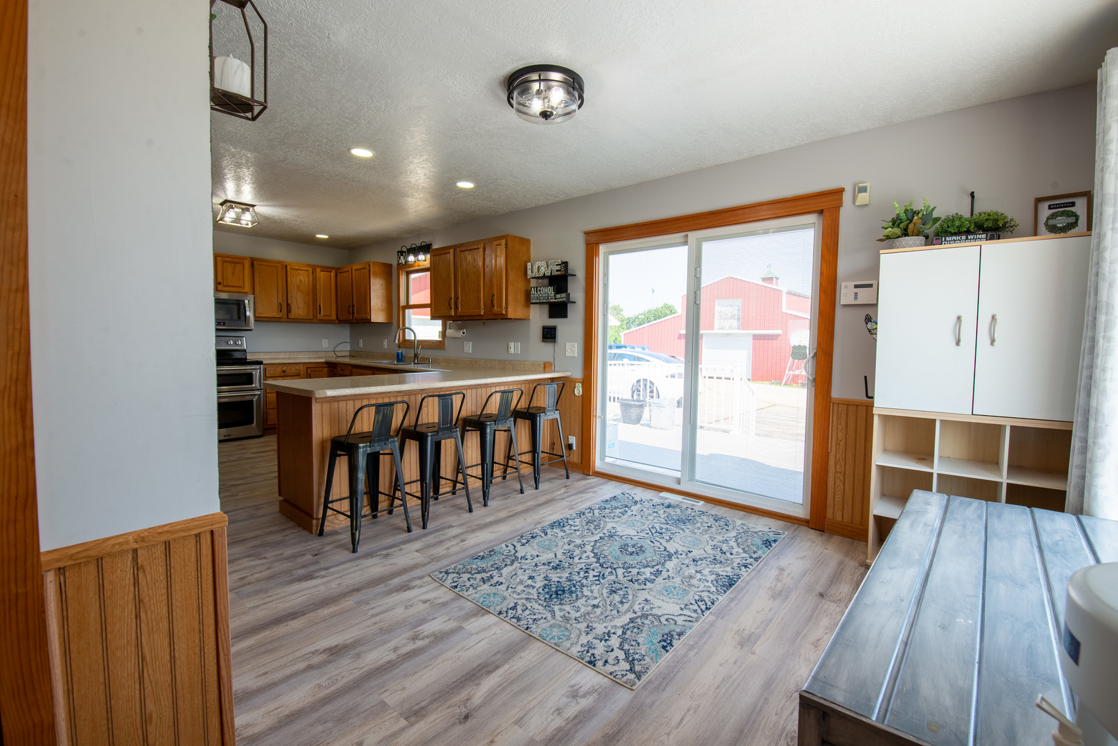 9109 Messmer Road Savanna, IL 61074 - Photo 19 of 31 a view of kitchen with cabinets and wooden floor